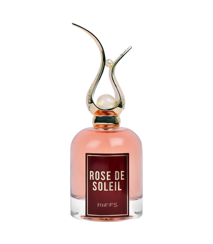 Rose de Soleil perfume bottle with elegant gold cap and pearl accents, pink fragrance liquid visible